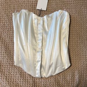 White silky strapless corset